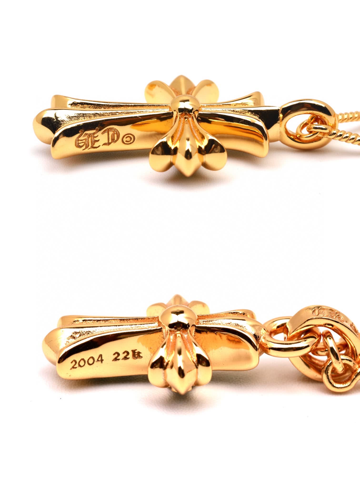 Chrome Hearts Gold Cross Pendant with Pink Stones